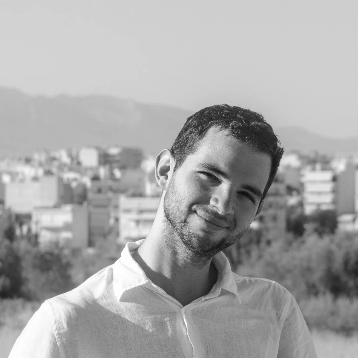 Dr. Christos Grapas