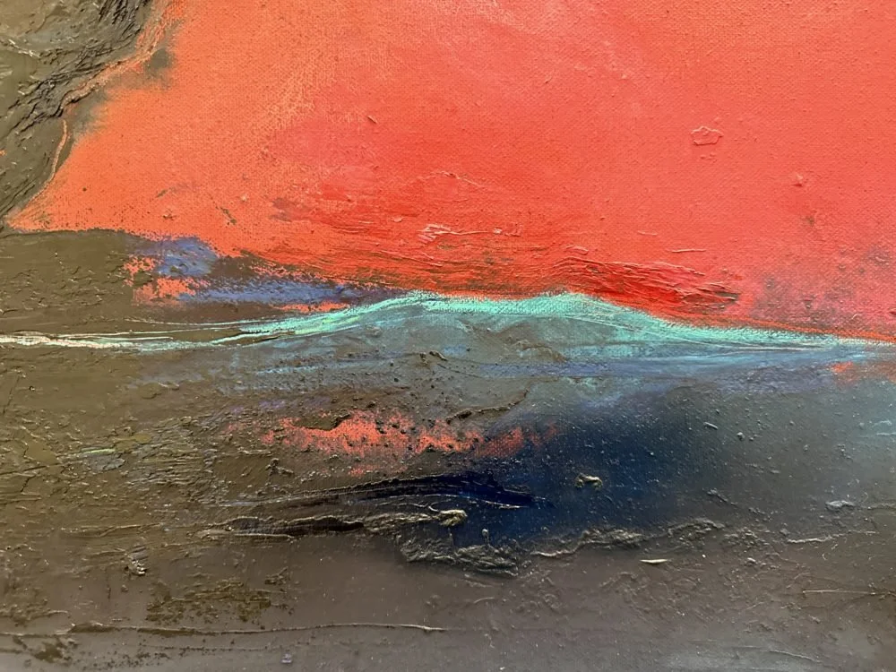 Abstract textured painting with orange, blue, and black blending colors.
