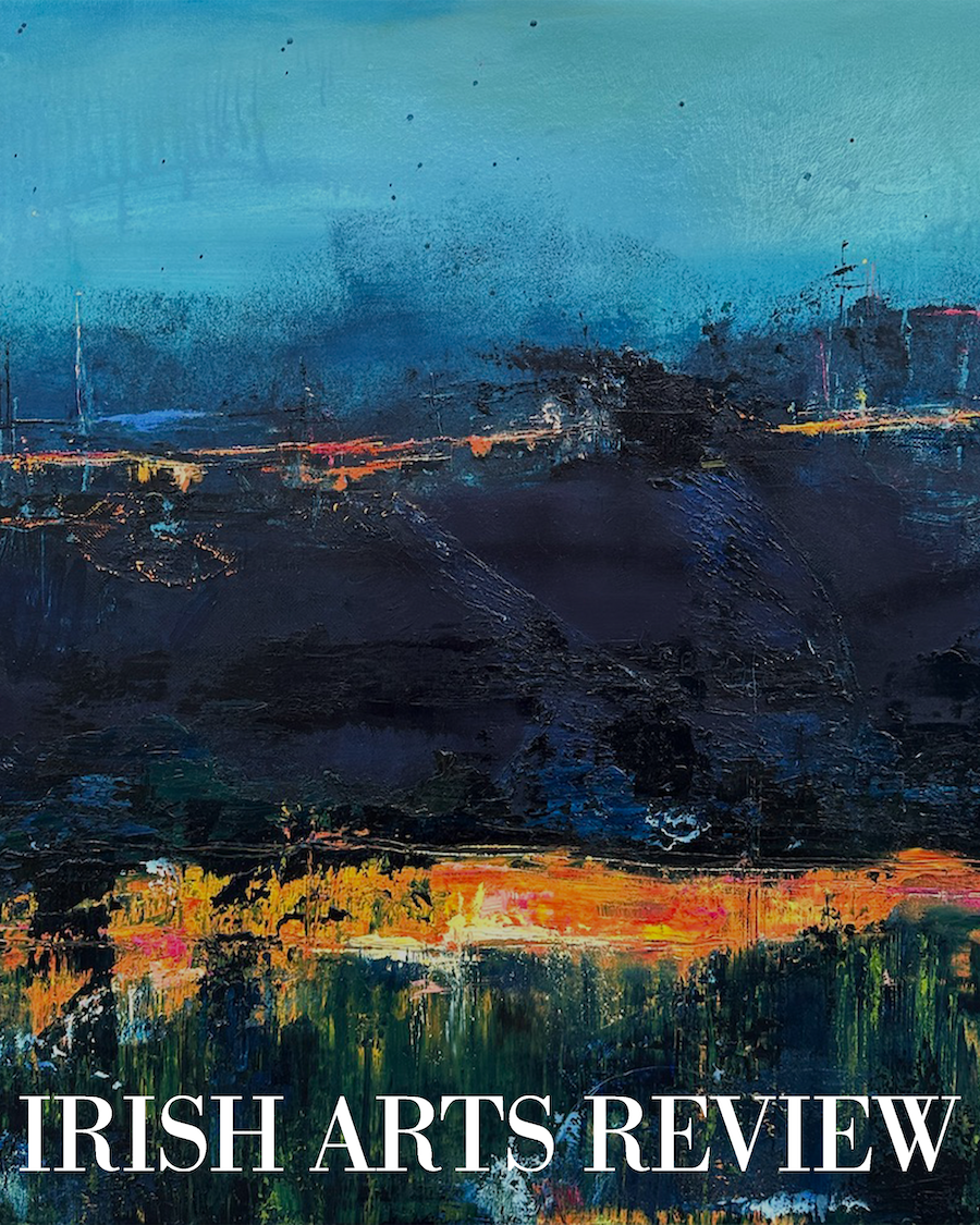 An abstract painting of a landscape with dark mountains, blue sky, and colorful sunset, with the text 'IRISH ARTS REVIEW' at the bottom.