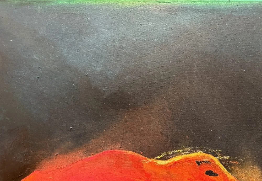Close-up of a textured surface with a gradient background from green to black and a red and orange painted shape at the bottom.