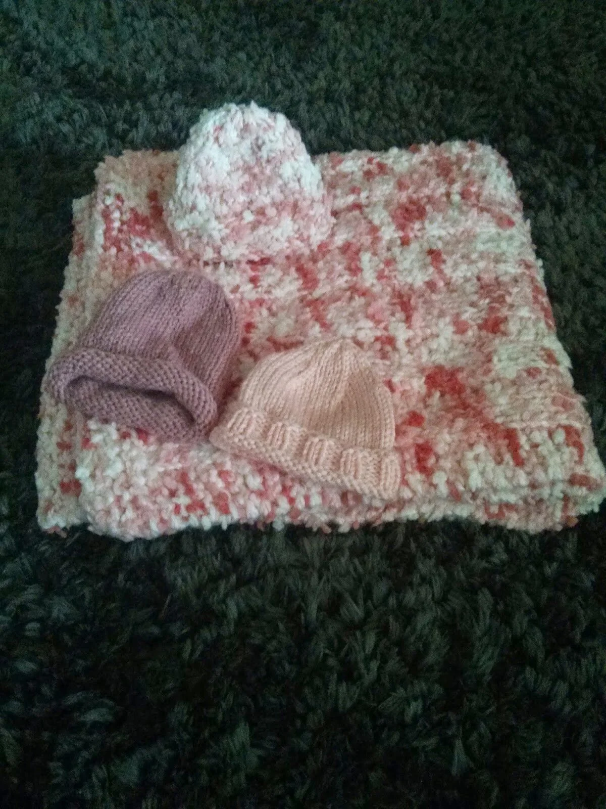 Beautiful blanket and hats made by Beth Johnson