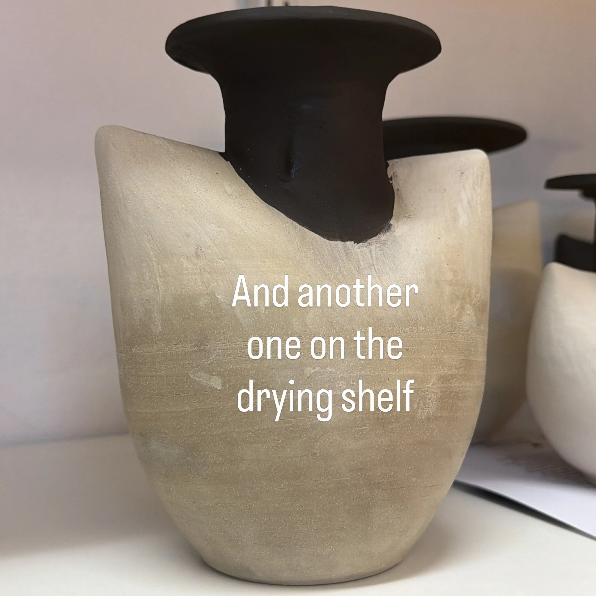 Ready for drying!  Saddle pot number 5 hits the shelf ahead of bisque firing.