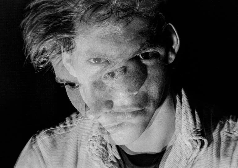 Self Portraits. Retro Collection. Black and white photo of a person with multiple face overlays creating a layered, surreal effect. Artist Czar Catstick BFA Hub Online British Bespoke Fine Art Gallery Fine Art Prints Editions Photography Flower Power