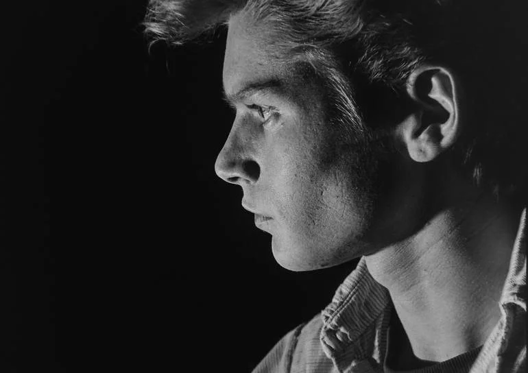 Self Portraits. Retro Collection. Artist Czar Catstick BFA Hub Online British Bespoke Fine Art Gallery Fine Art Prints Editions Photography Flower Power Black and white profile portrait of a young man with textured hair, wearing a collared shirt, loo