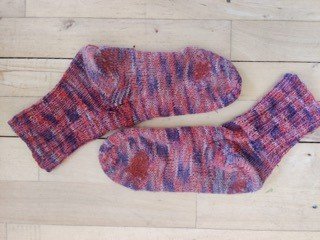 Repaired socks (a gift from her boyfriend's grandma)