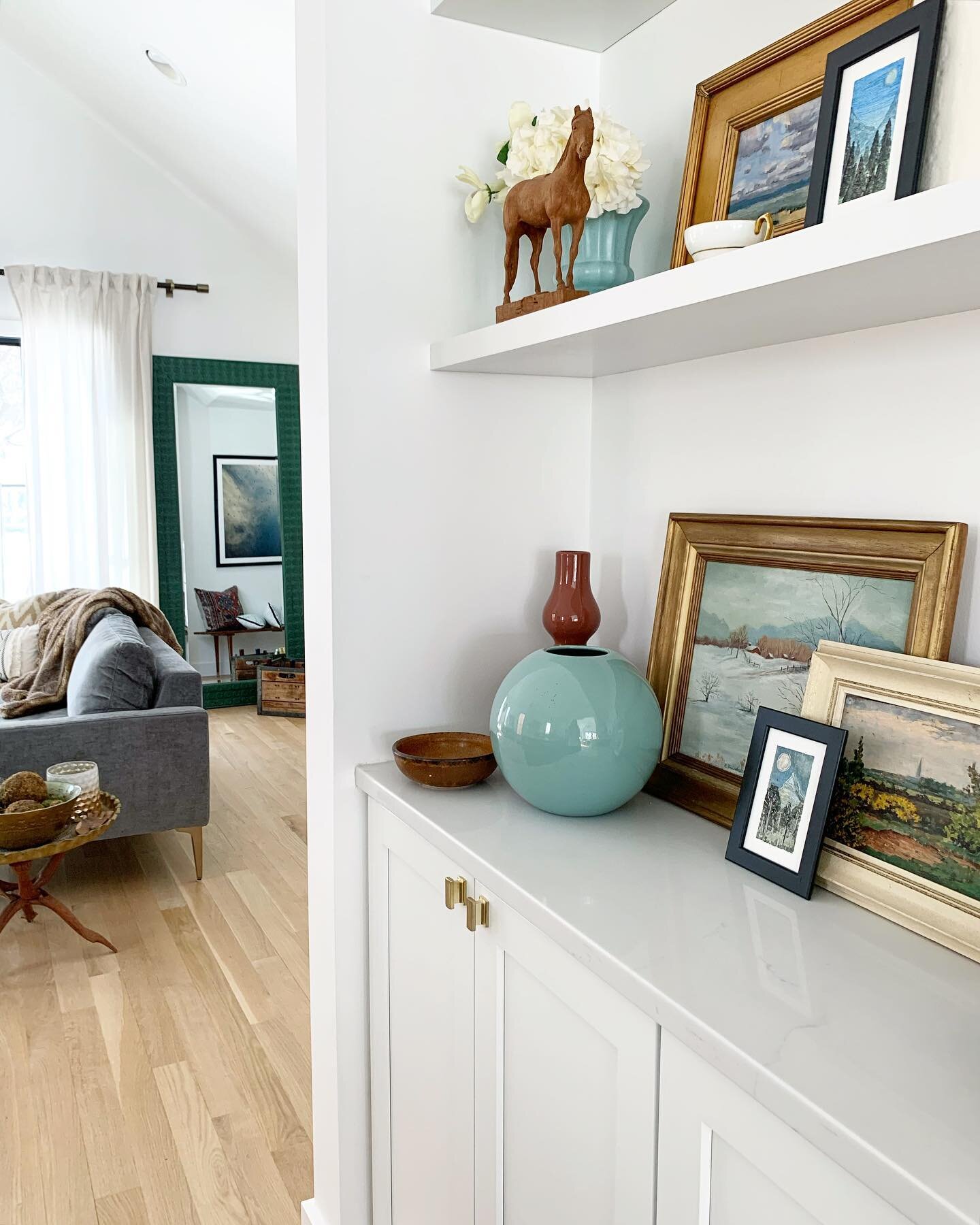 While my recent stories have been filled with bright colors as I style our playroom in the basement, our main floor has a completely different color palette. 
What can I say, on a day-to-day basis, I love the calmness that neutrals bring to our home
