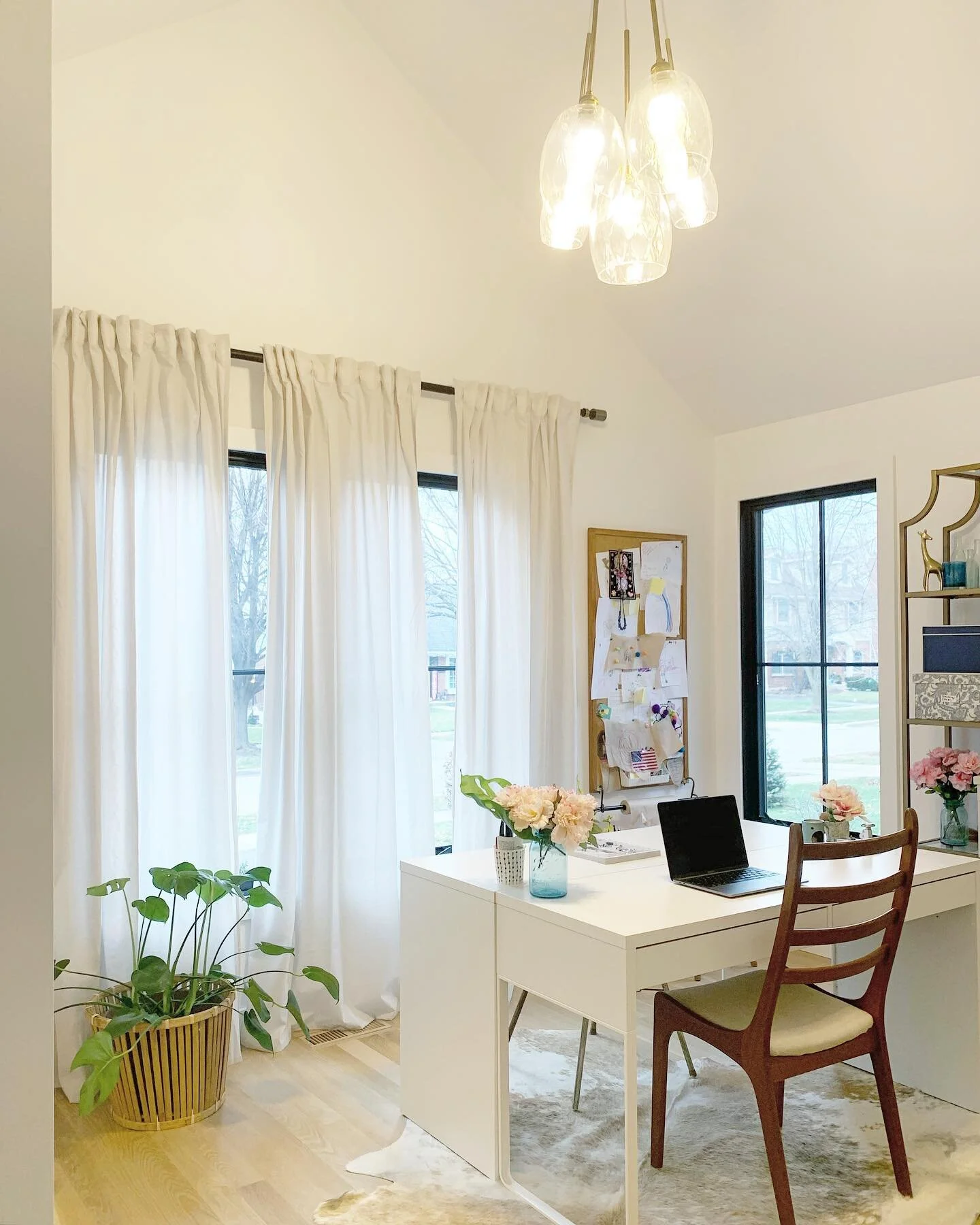 Can you believe I made this chandelier for my office, from scratch? Instead of spending thousands, I learned how to thread up sockets with wire and make five separate pendants. All in all this project cost me $165 in electrical components, brass sock