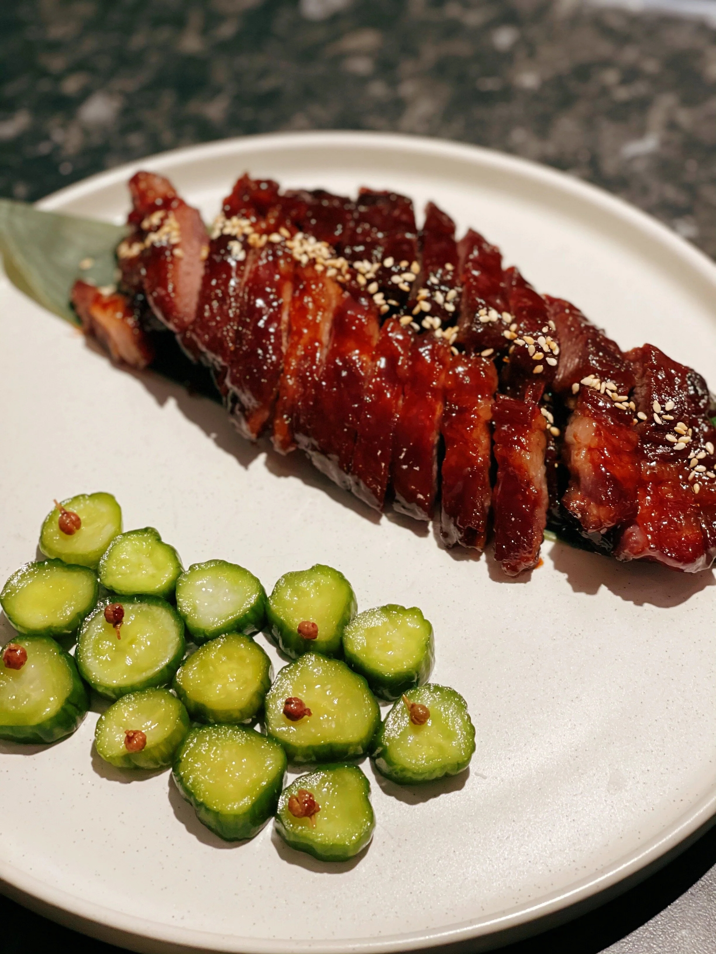 Honey Glazed Iberico Char Siu with Pickled Cucumber&nbsp;蜜汁西班牙黑猪叉烧配腌黄瓜£25