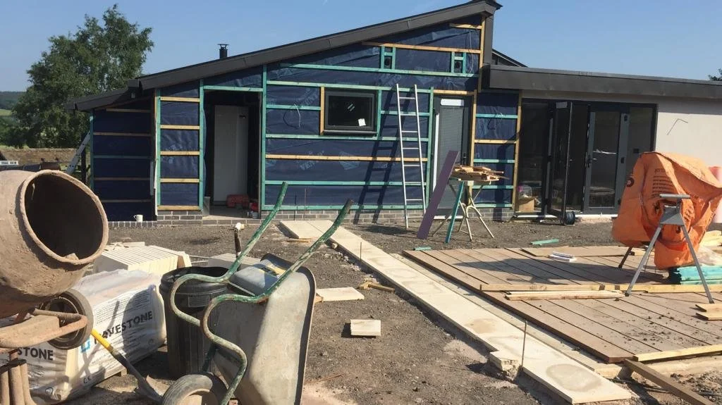 Breathable membrane and batons on top of block work and slabs laid around swimming pool