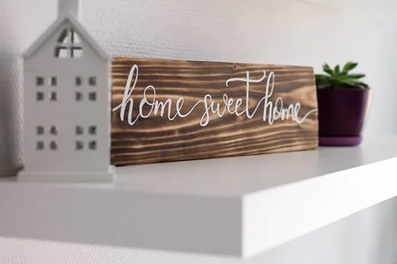 Family Living photo of wood sign