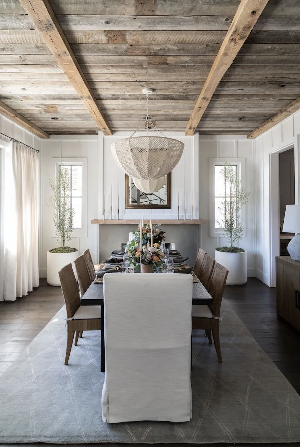 photo of a dining room dining set and wood ceiling