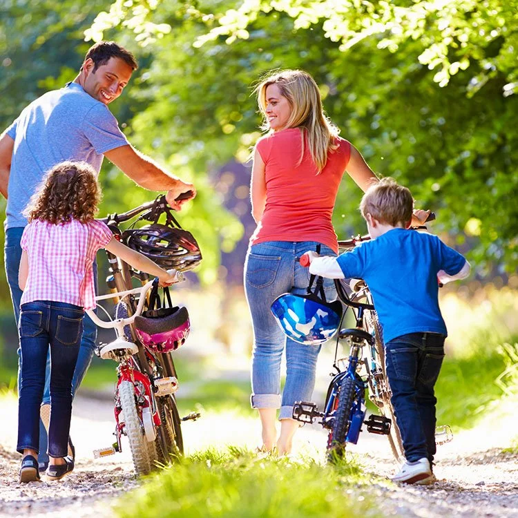 Photo from Family Living article showing family riding bikes together