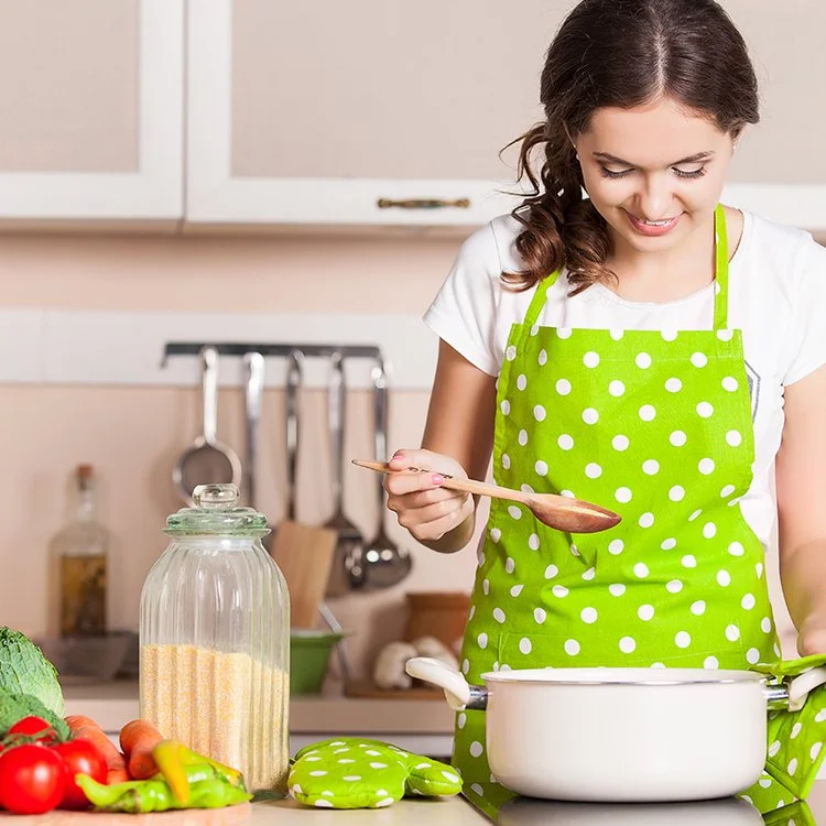 Young Mom Cooking In Kitchen from Family Living article