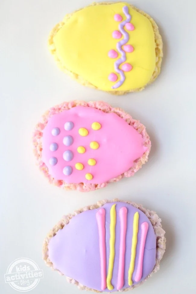 rice crispy treats with frosting in the shape of Easter eggs