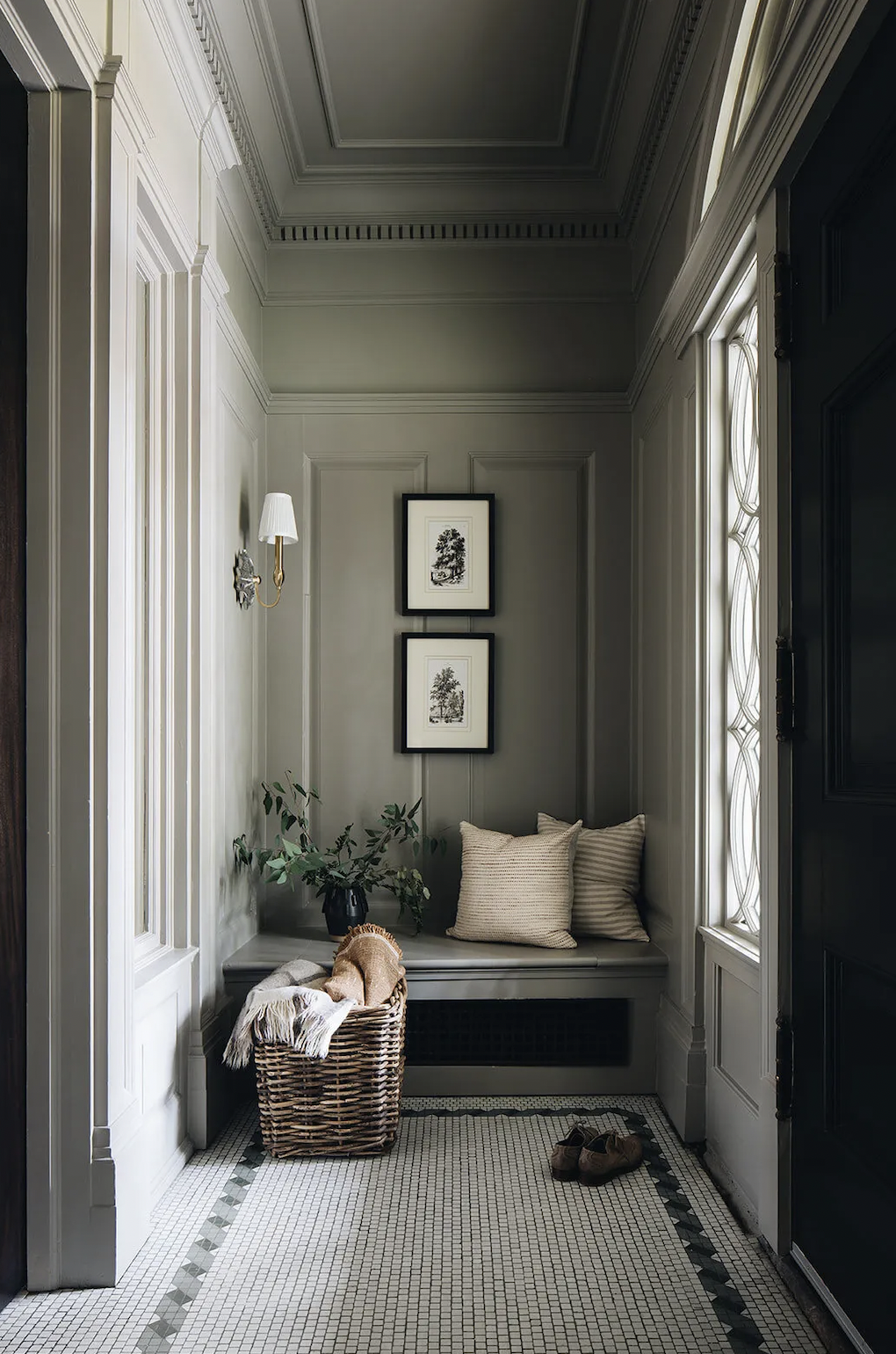 Nook decorated with a bench and photos