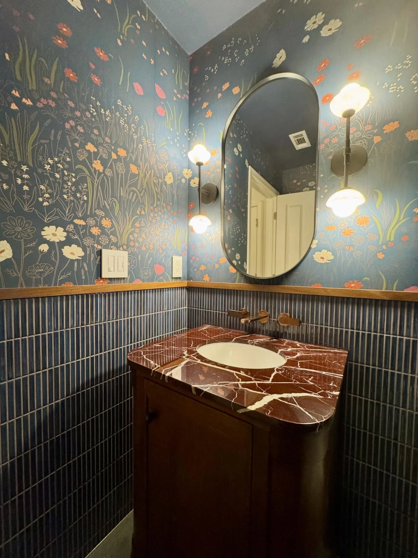 So many details went into this #powderroom : rose gold faucet, #rossolevanto countertop, #hyggeandwest wallpaper and #kitkattiles #ninajizhardesign