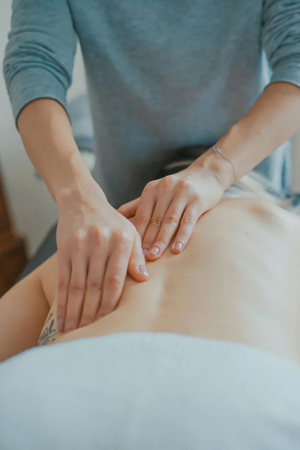 Patient receiving therapeutic massage Chicago