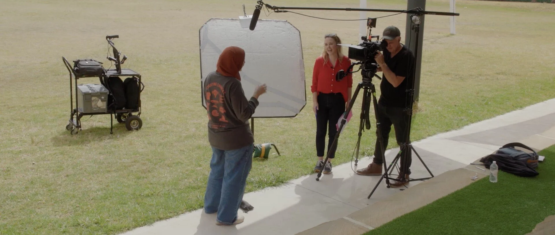 Still image from the film "Raising Superheroes" showing an interviewing session behind the scenes