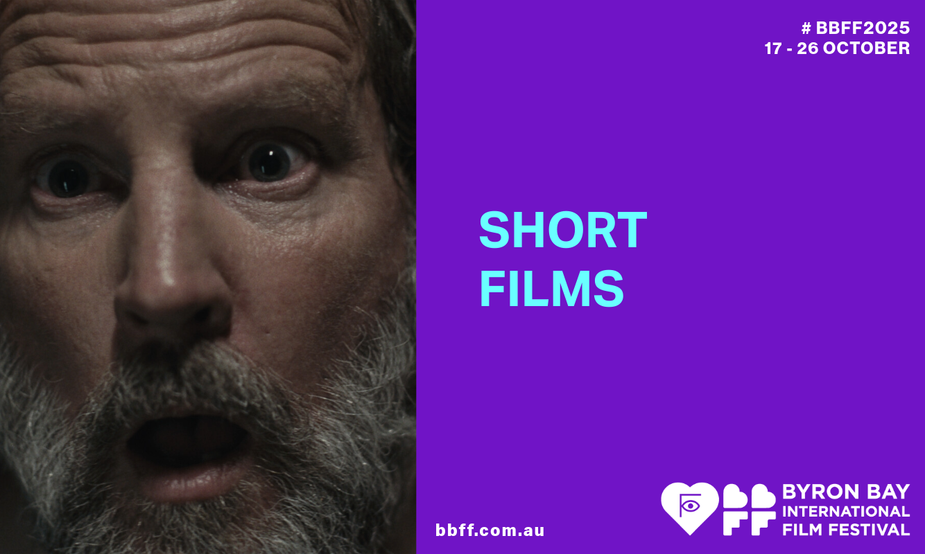 Close-up of a surprised older man with a grey beard on the left, alongside a purple panel on the right displaying the words “SHORT FILMS” and event details.