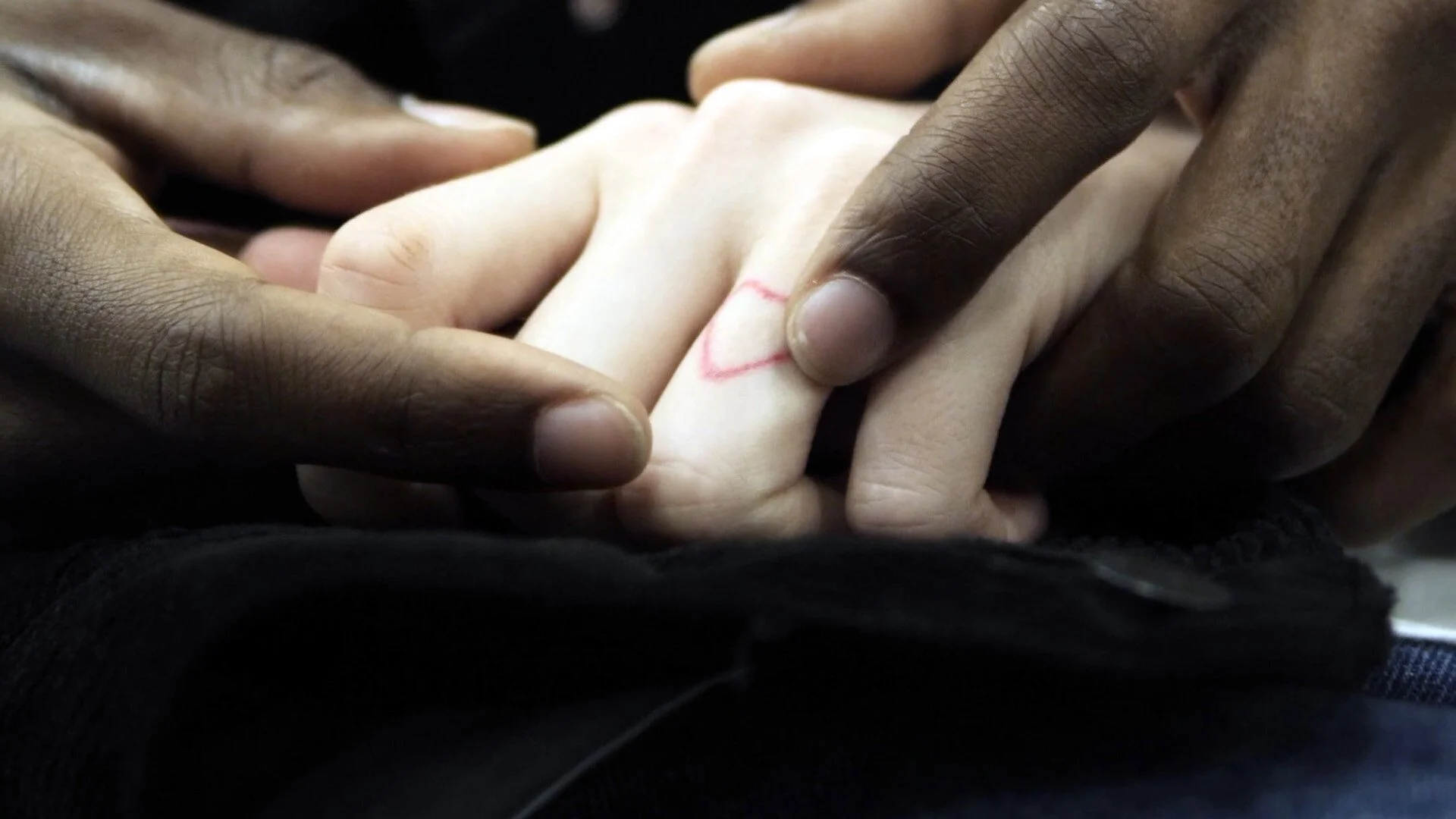 Photo 6 THR_Still_26_holgingHands.jpg
