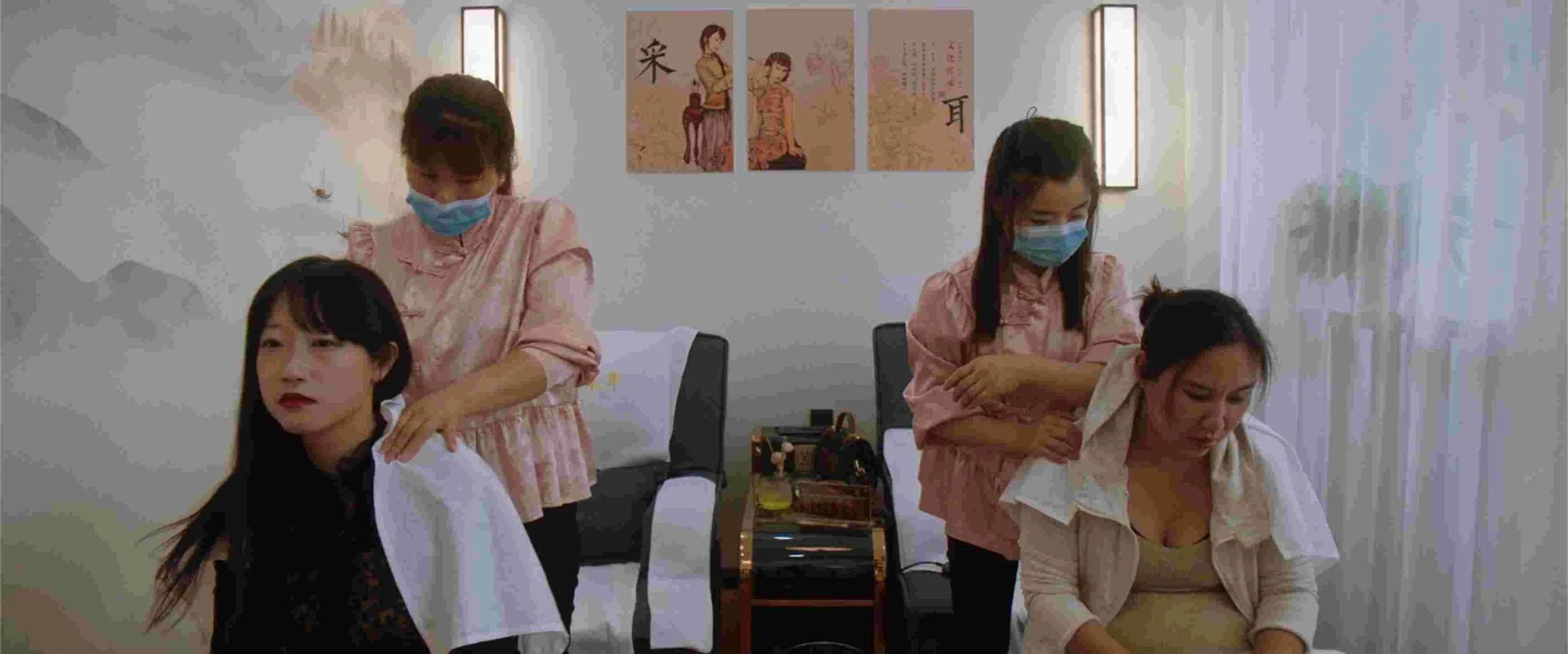 Teacher Wang and Fei Fei massage.jpg