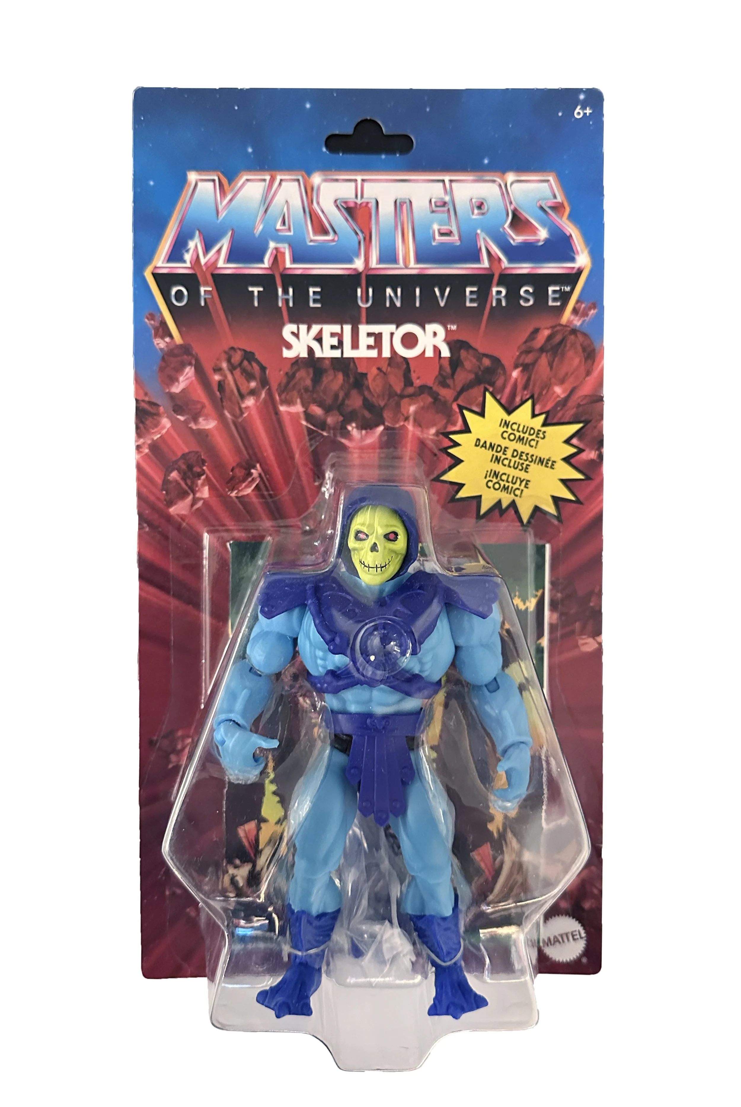 Mattel MOTU Origins Skeletor action figure in original trilingual retail blister card packaging, closed-mouth face variant with yellow-green skull, purple hooded cowl and blue body.