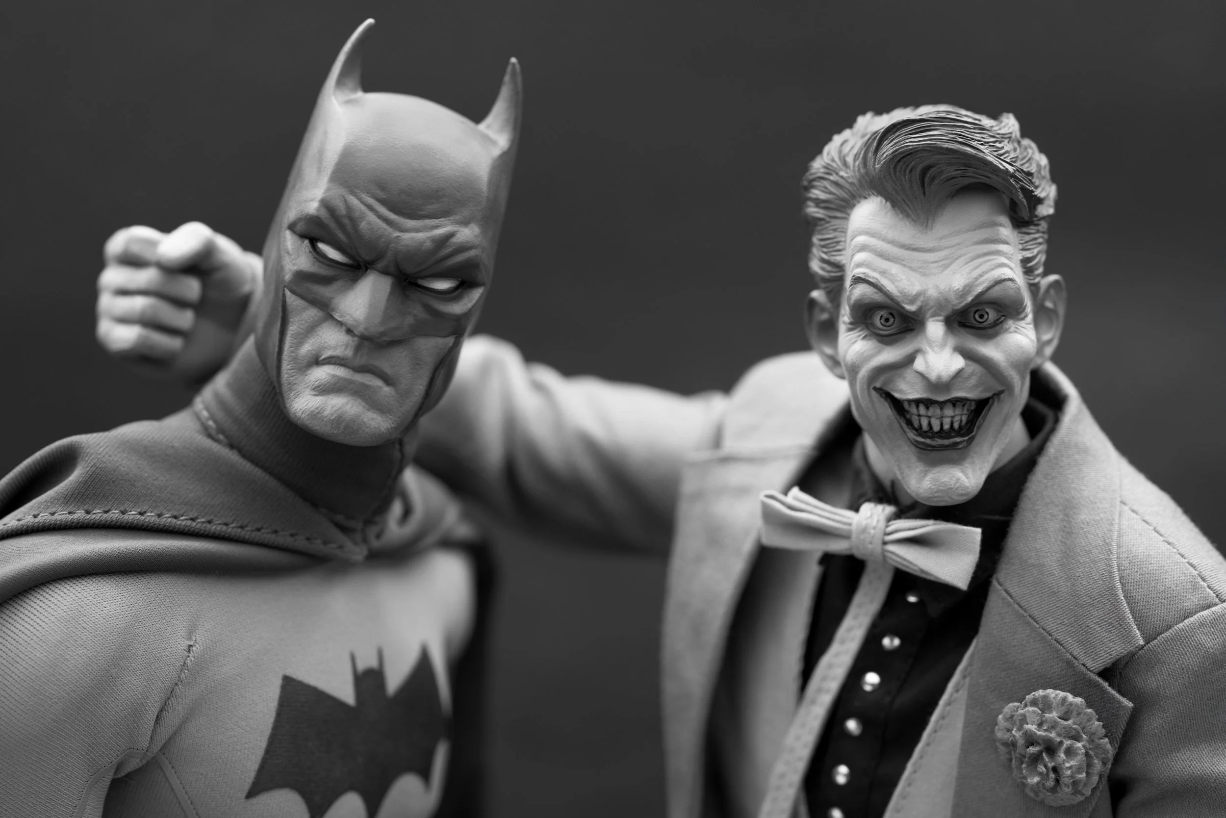 Detailed Batman and Joker figures representing an extensive pop culture collectibles shop in Australia selling action figures, toys, and memorabilia from movies, anime series, TV shows, and major franchises like Star Wars, Marvel, DC comics, MOTU.