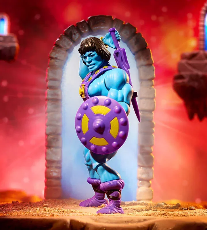 Mattel MOTU Origins He-Skeletor 5.5-inch figure in action pose with purple shield and axe accessories, blue-skinned Keldor multiverse variant.