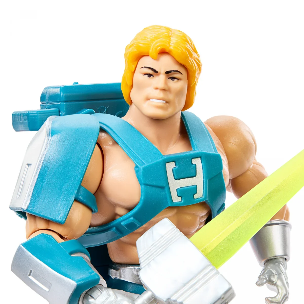 Close-up of Mattel Masters of the Universe Origins Laser Power He-Man figure showing blue battle armor with white H emblem, blonde hair, and detailed face sculpt.