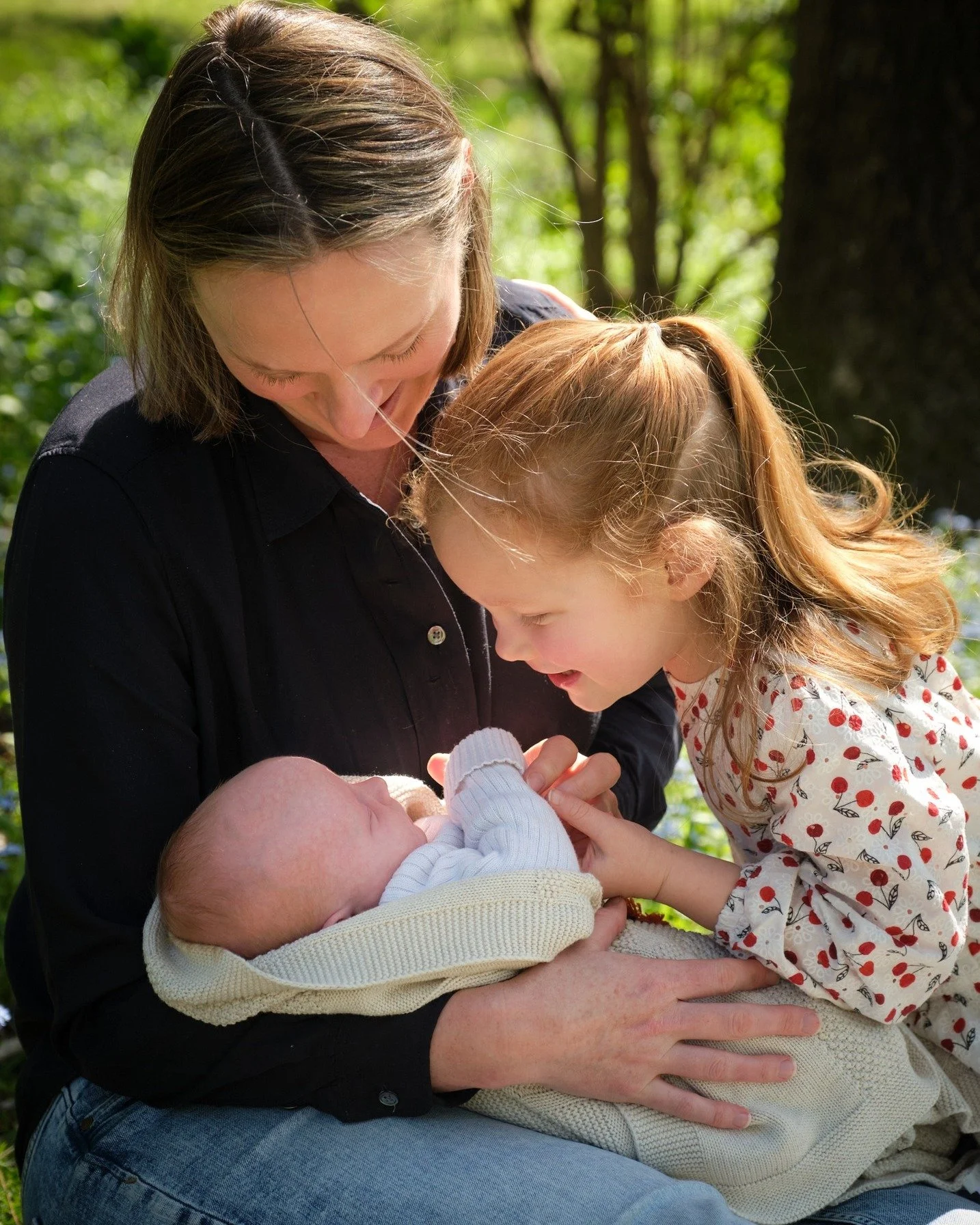 Cold.
Windy.
A four-year-old with opinions.
A four-week-old baby.

And still&hellip; this session was magic.

We started in the hazelnut trees and forget-me-nots, wrapped up warm, Walter fast asleep in his mum&rsquo;s arms.

Was it &ldquo;perfect&rdq