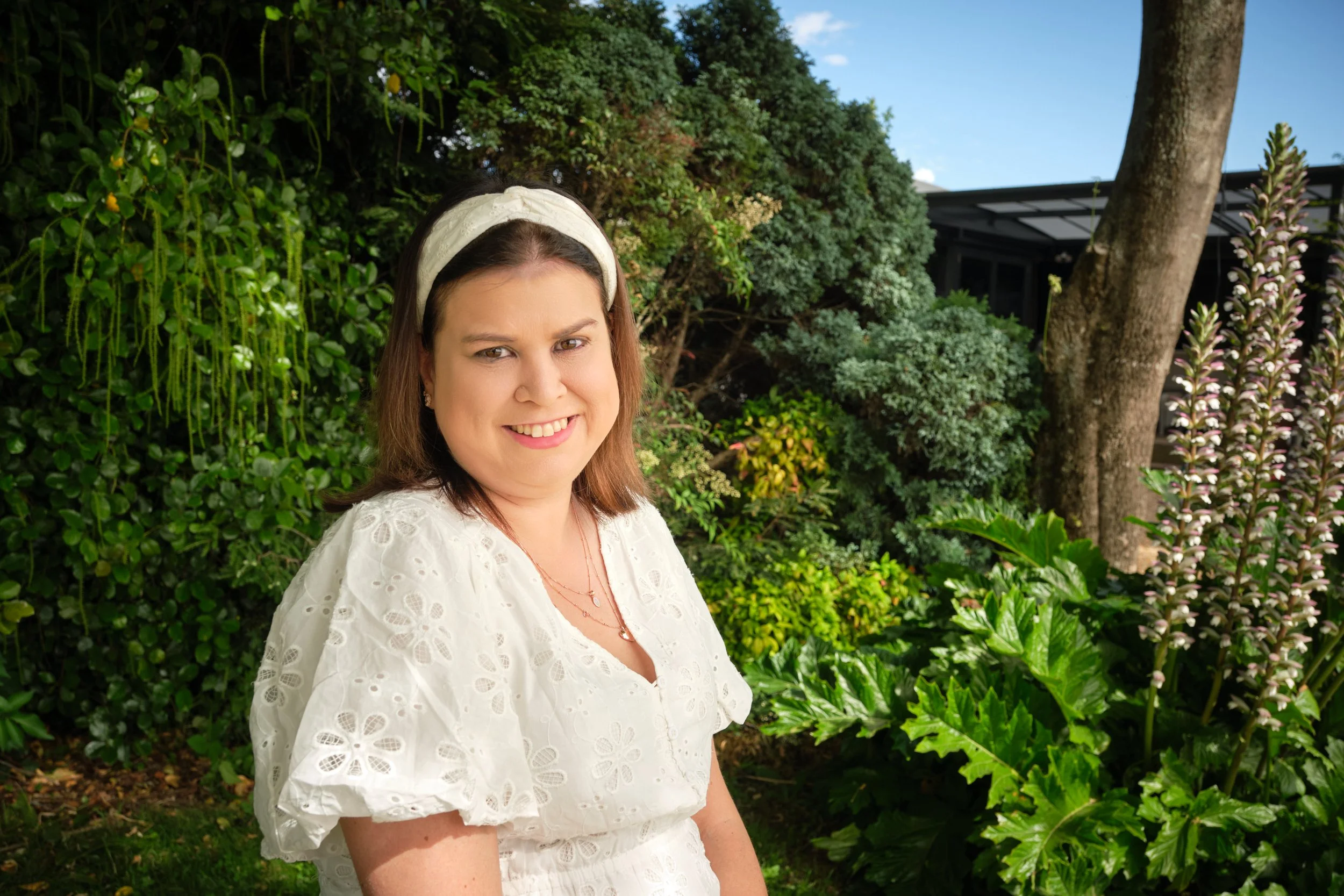 clark-at-home-farm-launceston-extended-family-woman-smiling-garden-portrait-2.jpeg