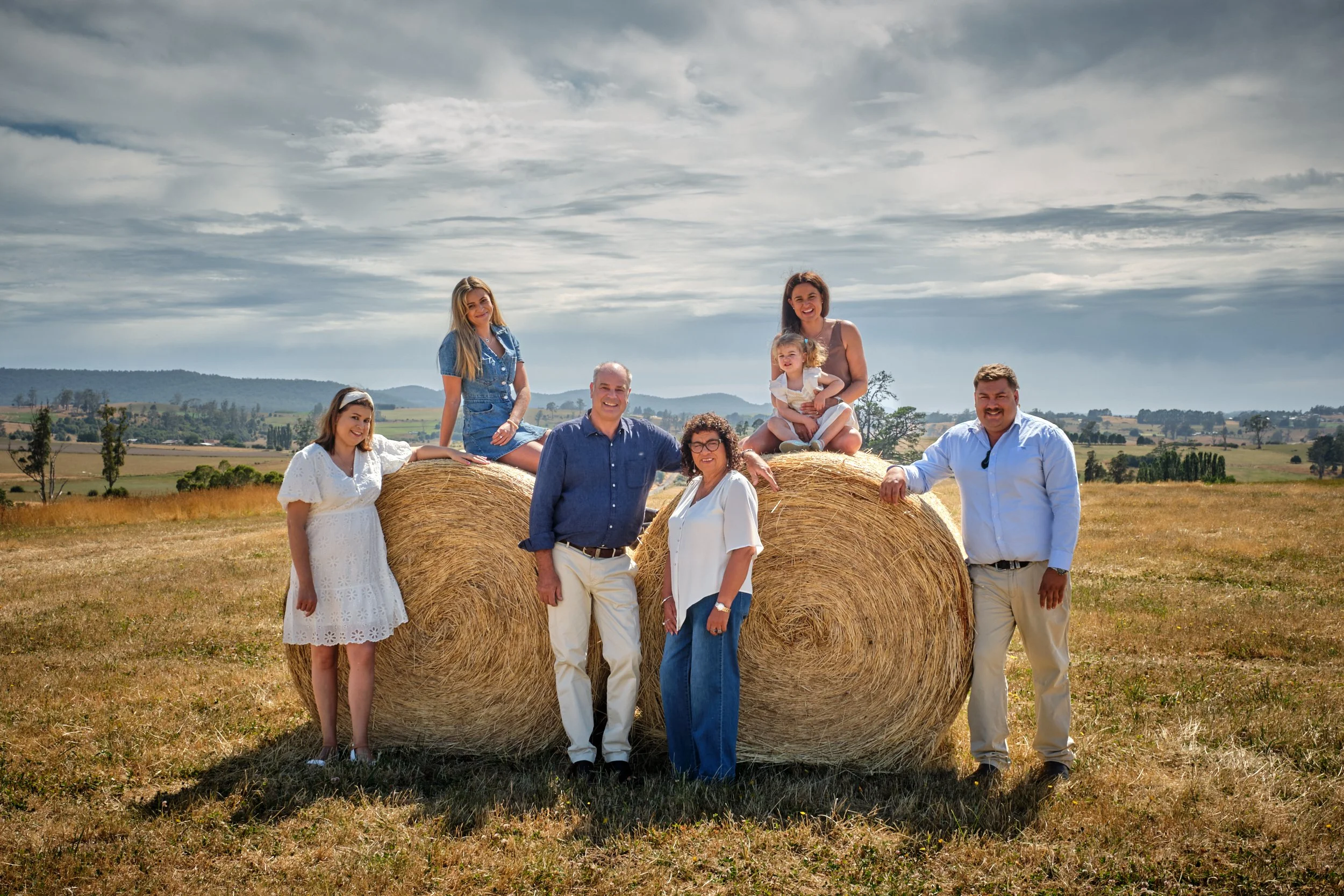 clark-launceston-extended-family-farm-session-hay-bales-rural-landscape.jpeg