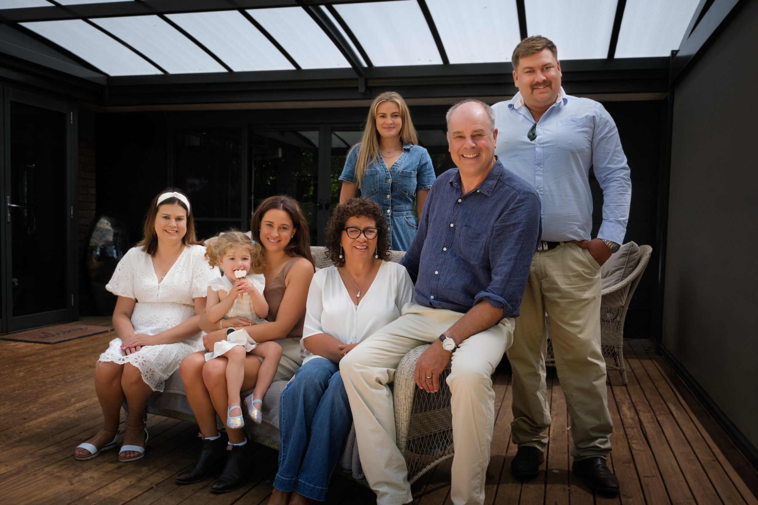 clark-launceston-extended-family-portrait-home-deck-smiling-multi-generation-group.jpeg