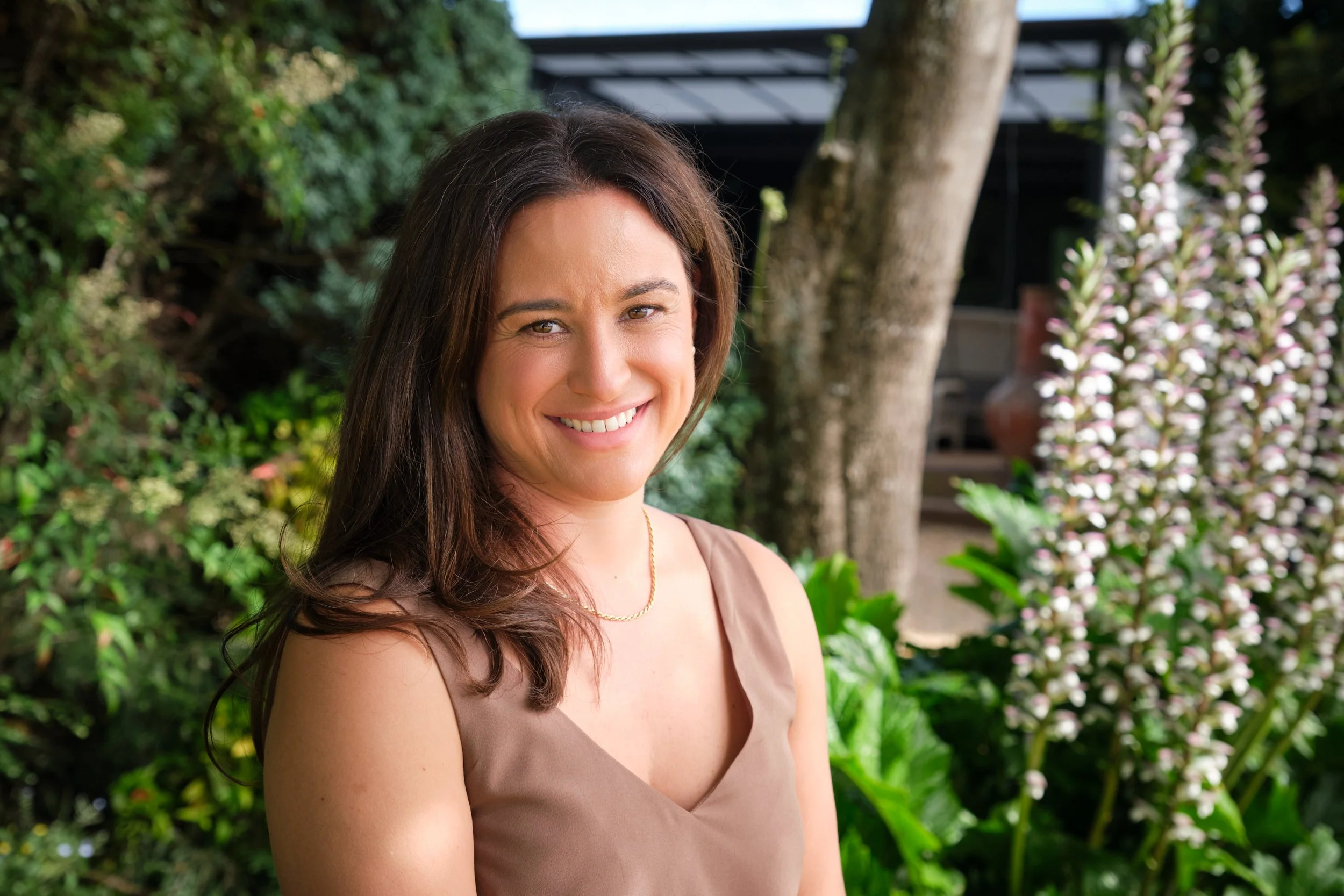 clark-launceston-extended-family-woman-smiling-garden-portrait.jpeg