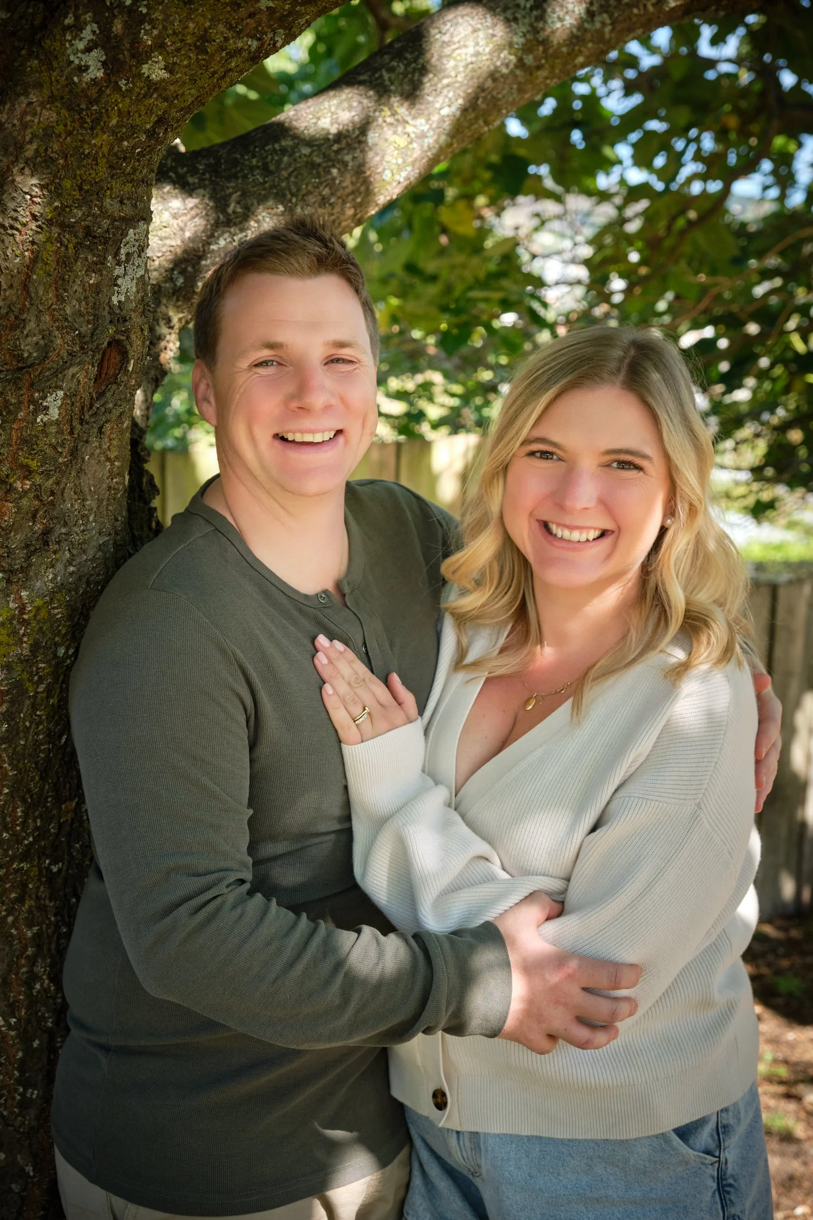 macdonald-launceston-family-portrait-photography-couple-smiling-under-tree.jpeg