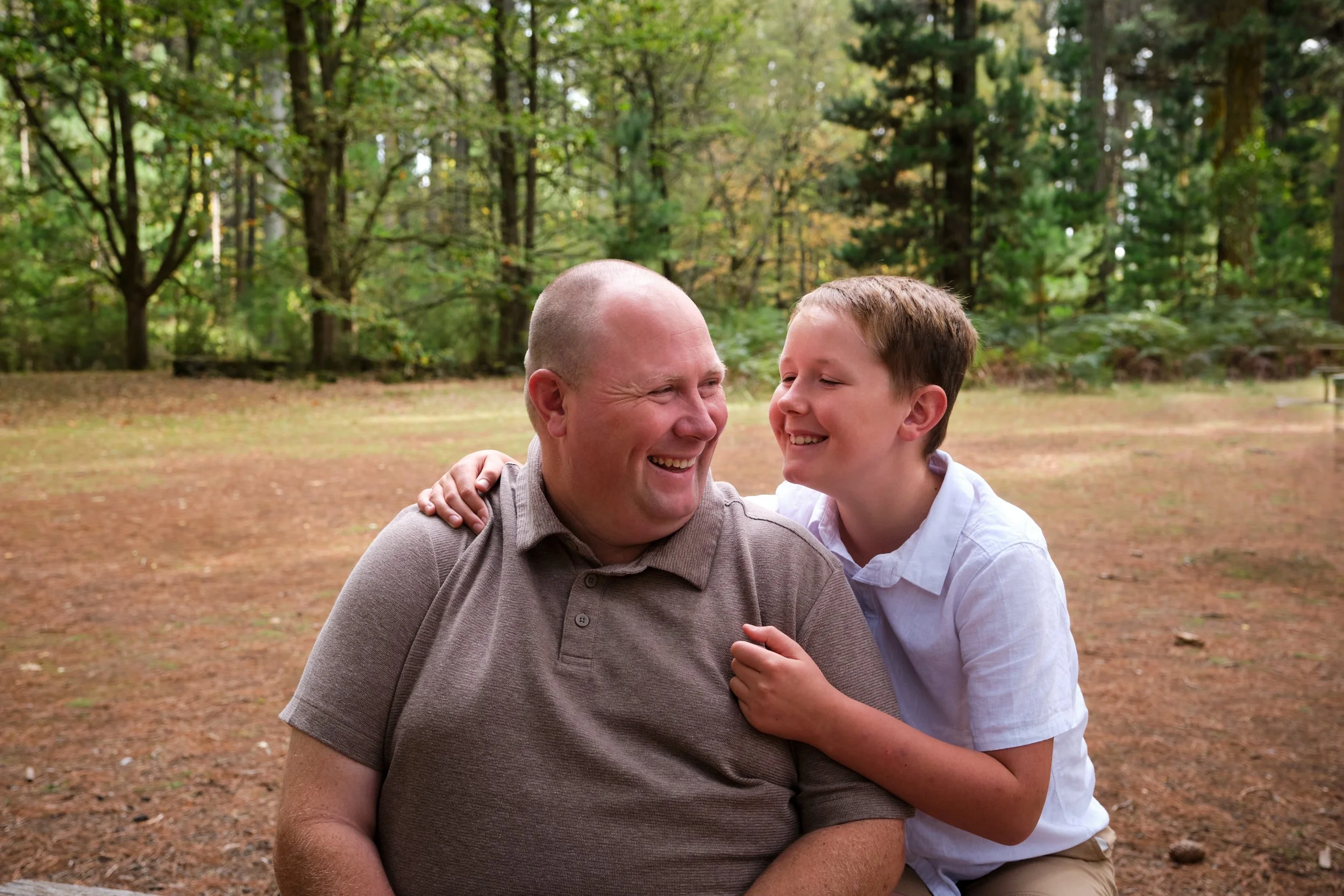 north-hollybank-launceston-family-photography-father-son-laughing-outdoor-forest-picnic.jpeg