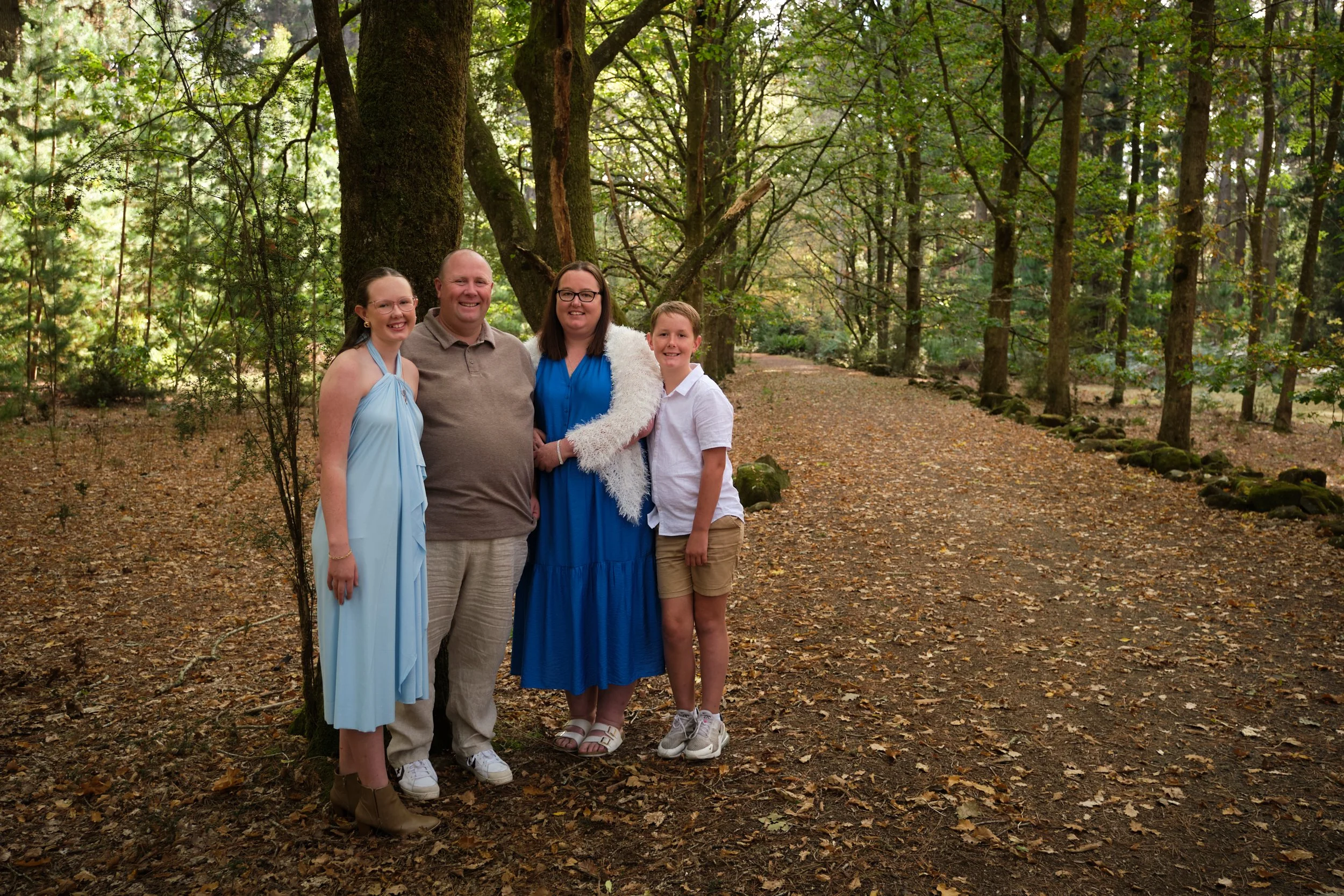 north-hollybank-launceston-family-photography-forest-path-portrait-smiling-family.jpeg