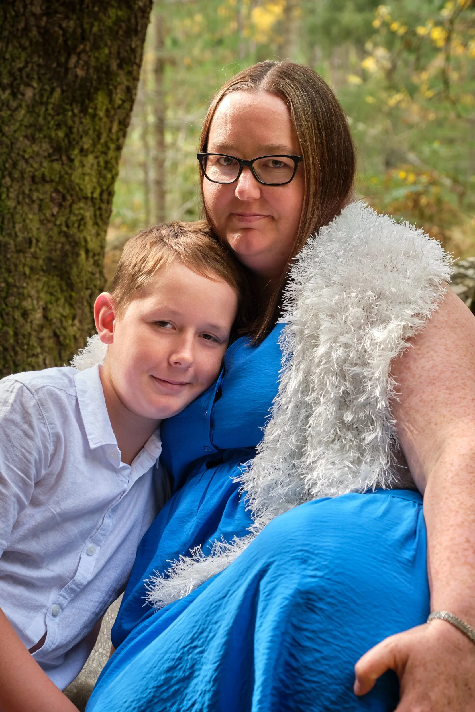 north-hollybank-launceston-family-photography-mum-and-son-cuddling-in-forest.jpeg
