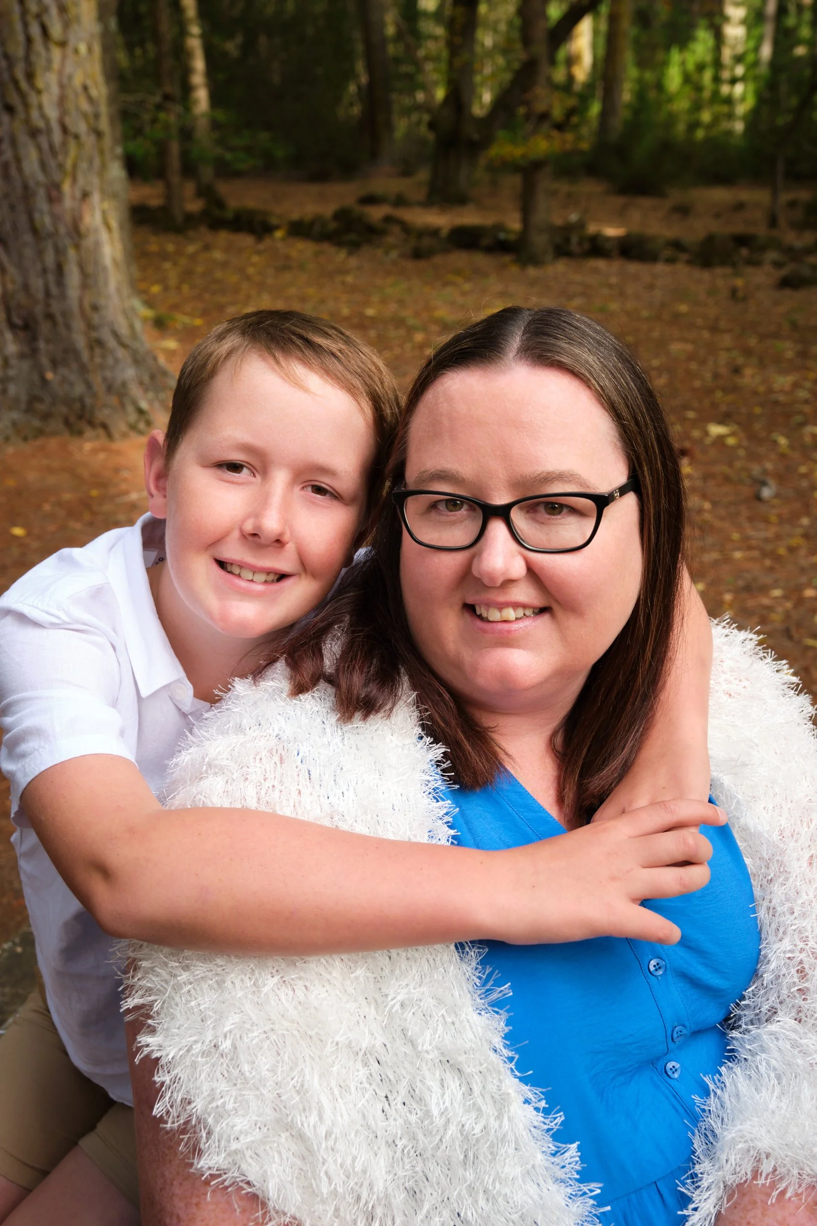 north-hollybank-launceston-family-photography-mum-and-son-hugging-in-forest.jpeg
