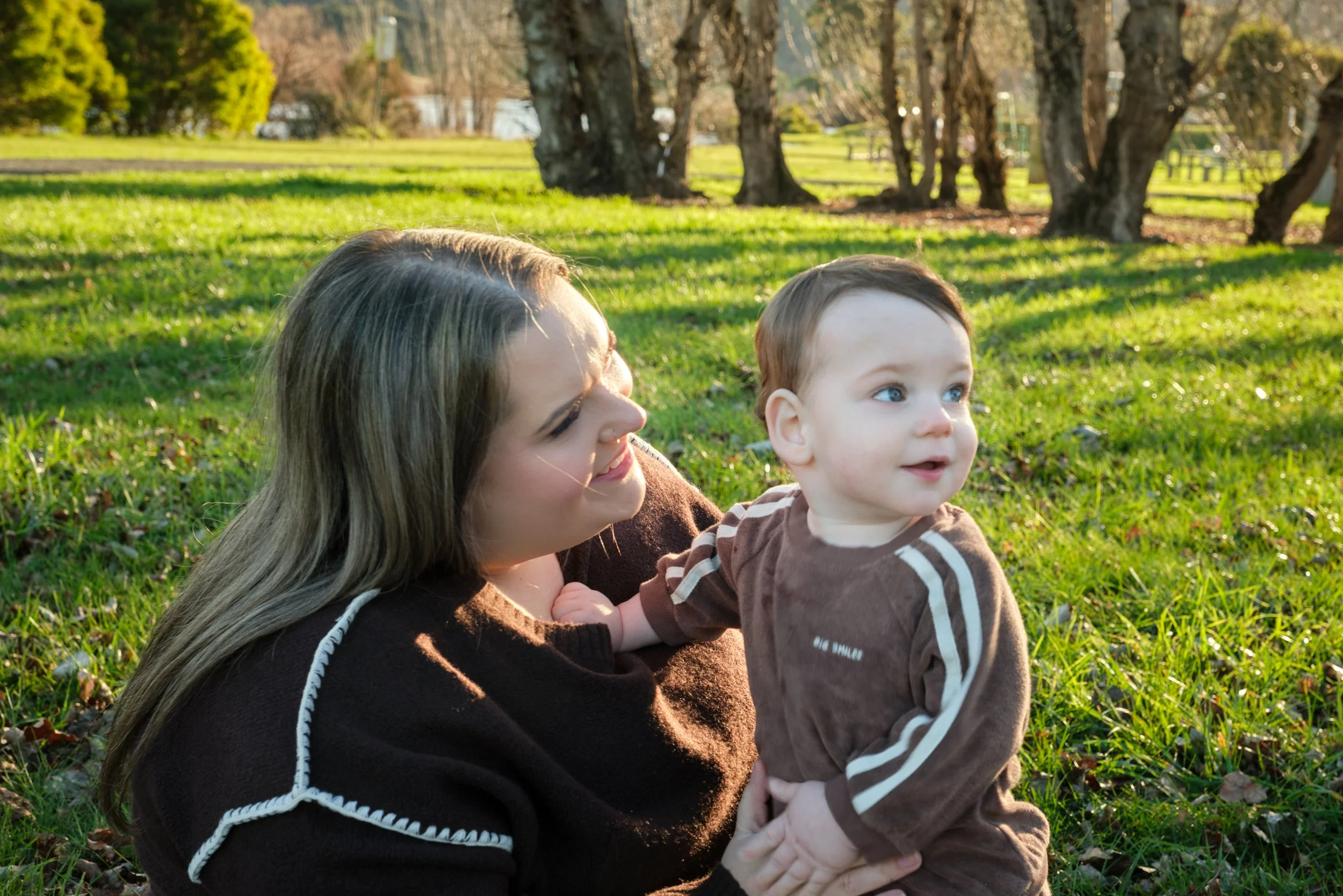 williams-hadspen-river-launceston-family-portrait-mother-holding-baby-outdoors.jpeg