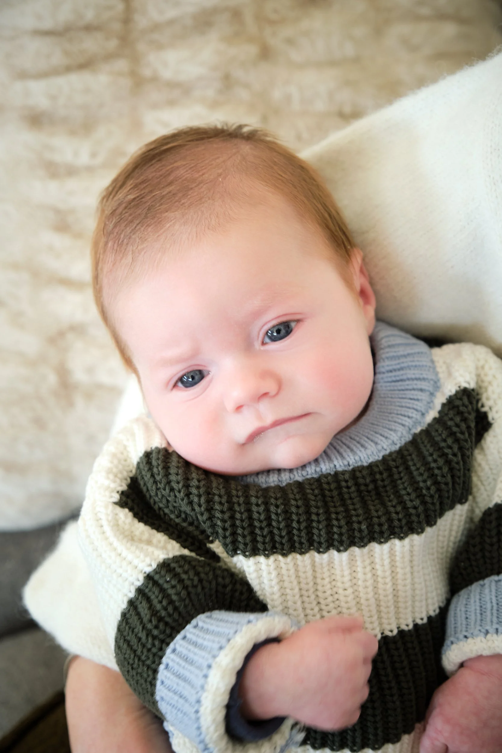 hill-launceston-newborn-family-photography-baby-in-striped-knit-sweater-at-home.jpeg