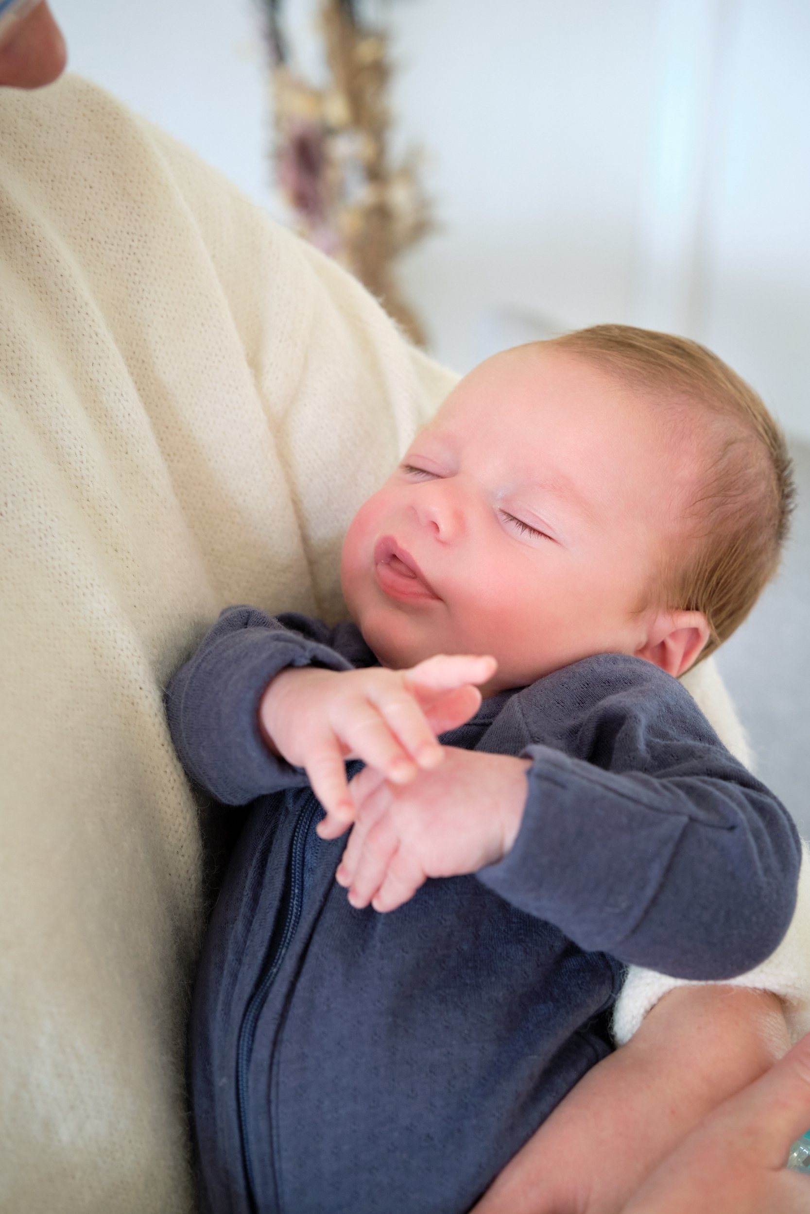 hill-launceston-newborn-family-photography-sleeping-baby-in-arms.jpeg