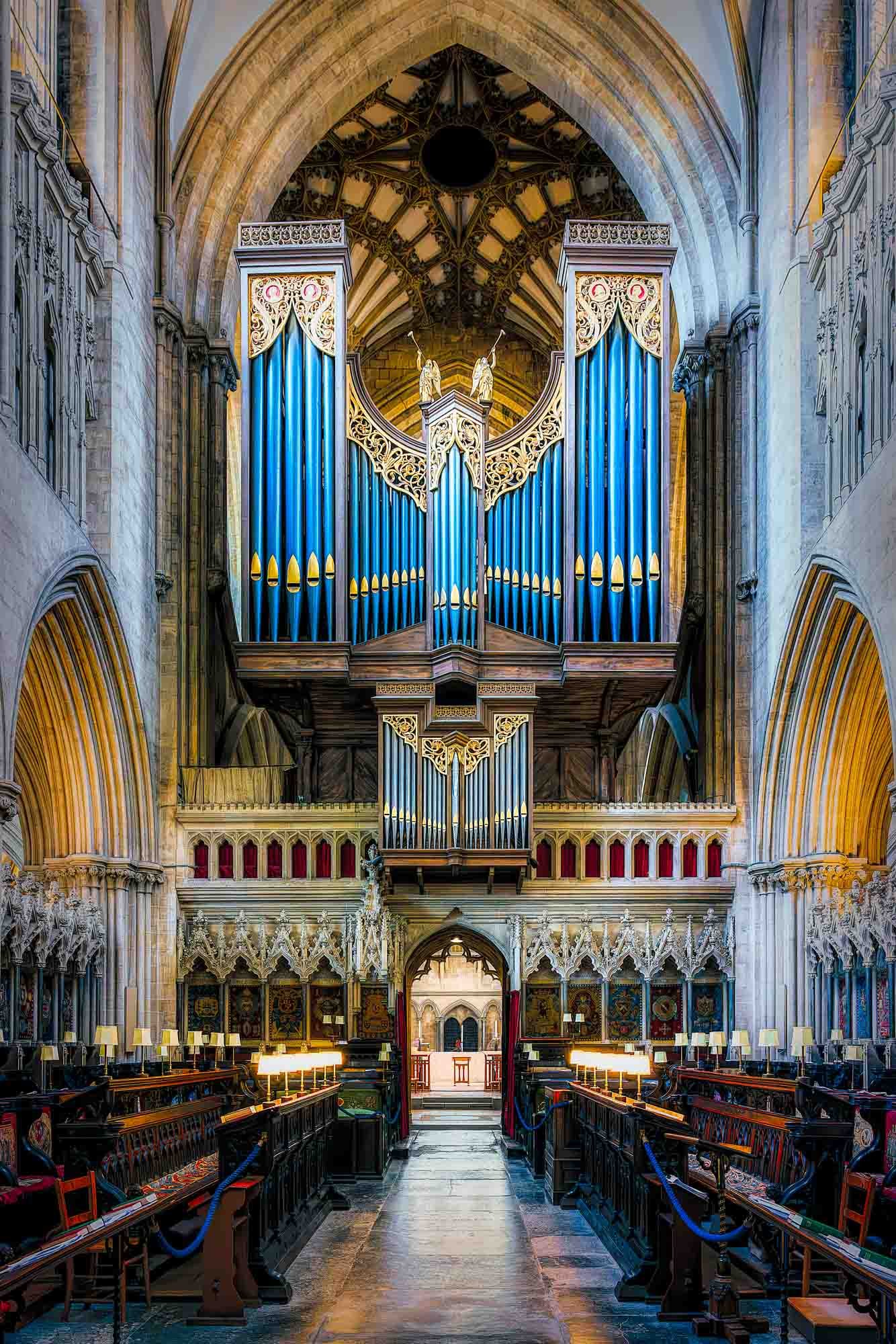 Wells Cathedral organ seen from below in a dramatic vertical composition