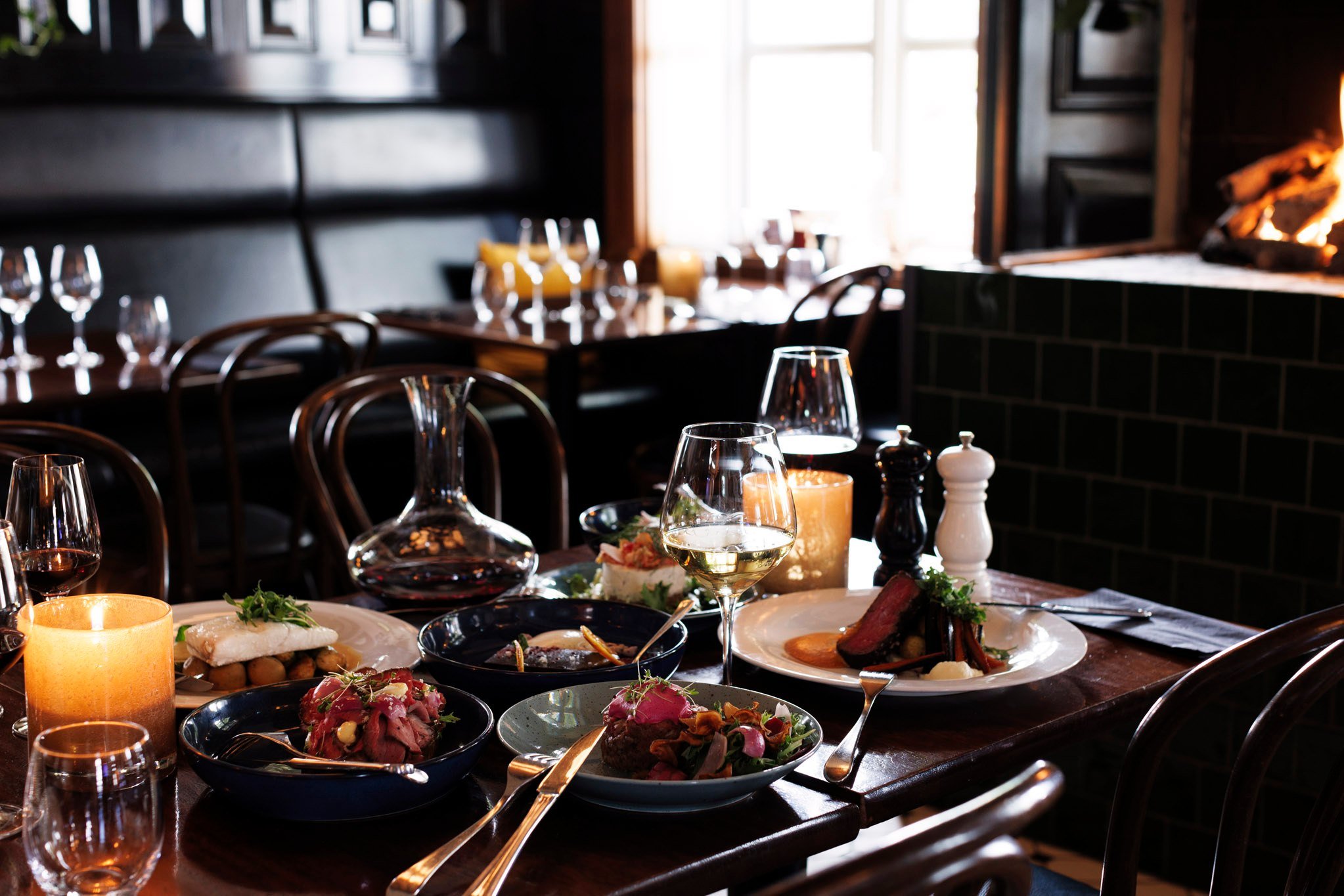 Gather around the table, savour every bite, and enjoy the warmth of good company.
There's something special about sharing a delicious meal by the fireplace&mdash;a cozy atmosphere, comforting flavours, and moments that turn into memories. 🥂✨

We loo