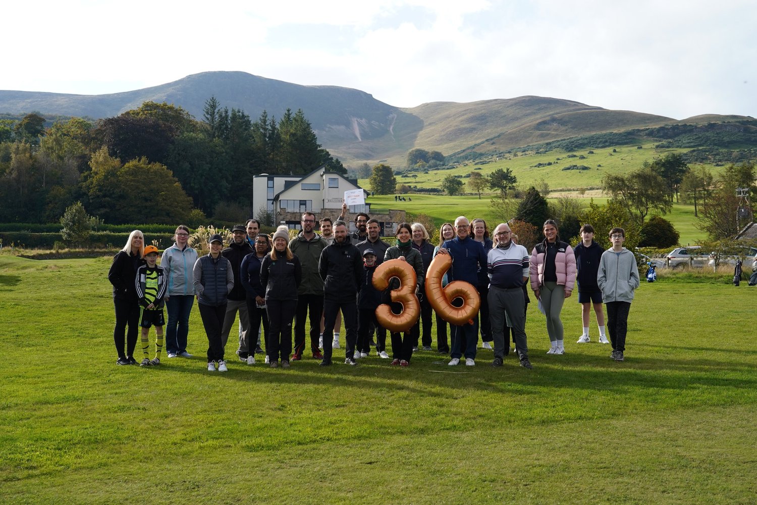 Score 36 Club golfers celebrating at Swanston