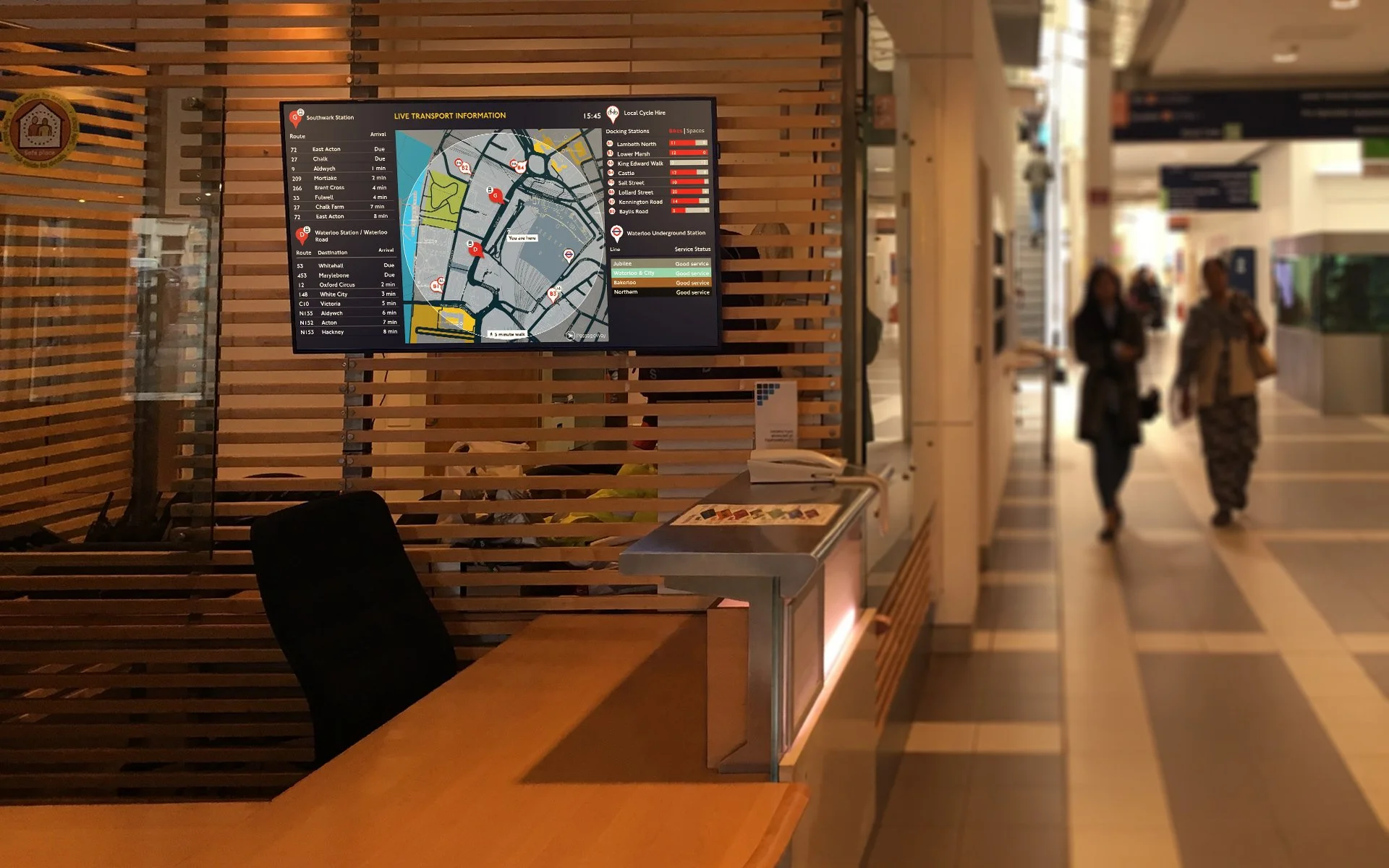 A PassageWay multi-modal digital sign diaplaying live local public transport options at a hospital