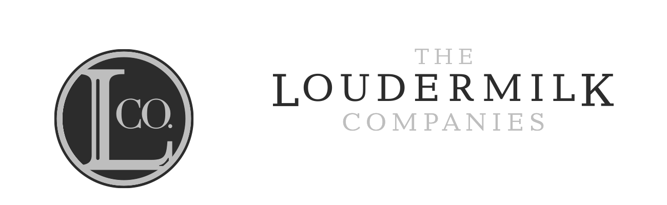 Logo of The Loudermilk Companies featuring a circular emblem with stylized initials T and L, alongside the company name.