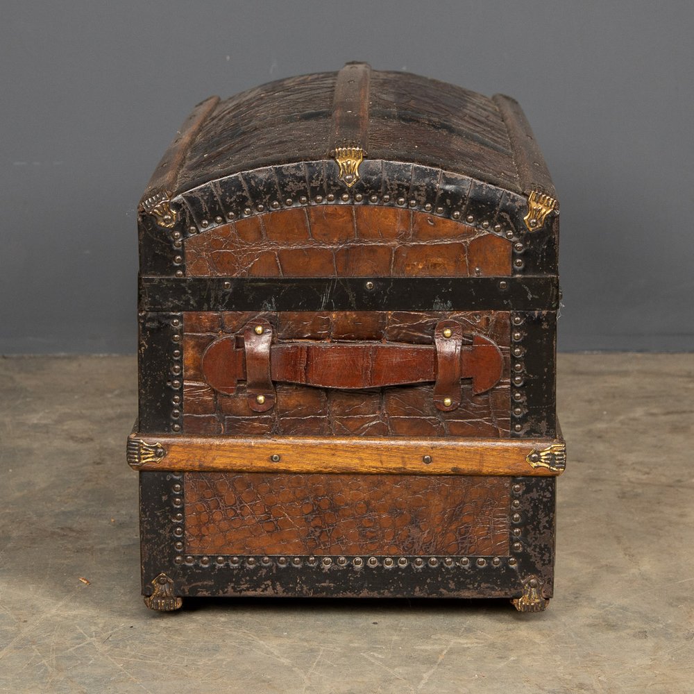 Lot 165 - A FAUX CROCODILE SKIN LEATHER STEAMER TRUNK