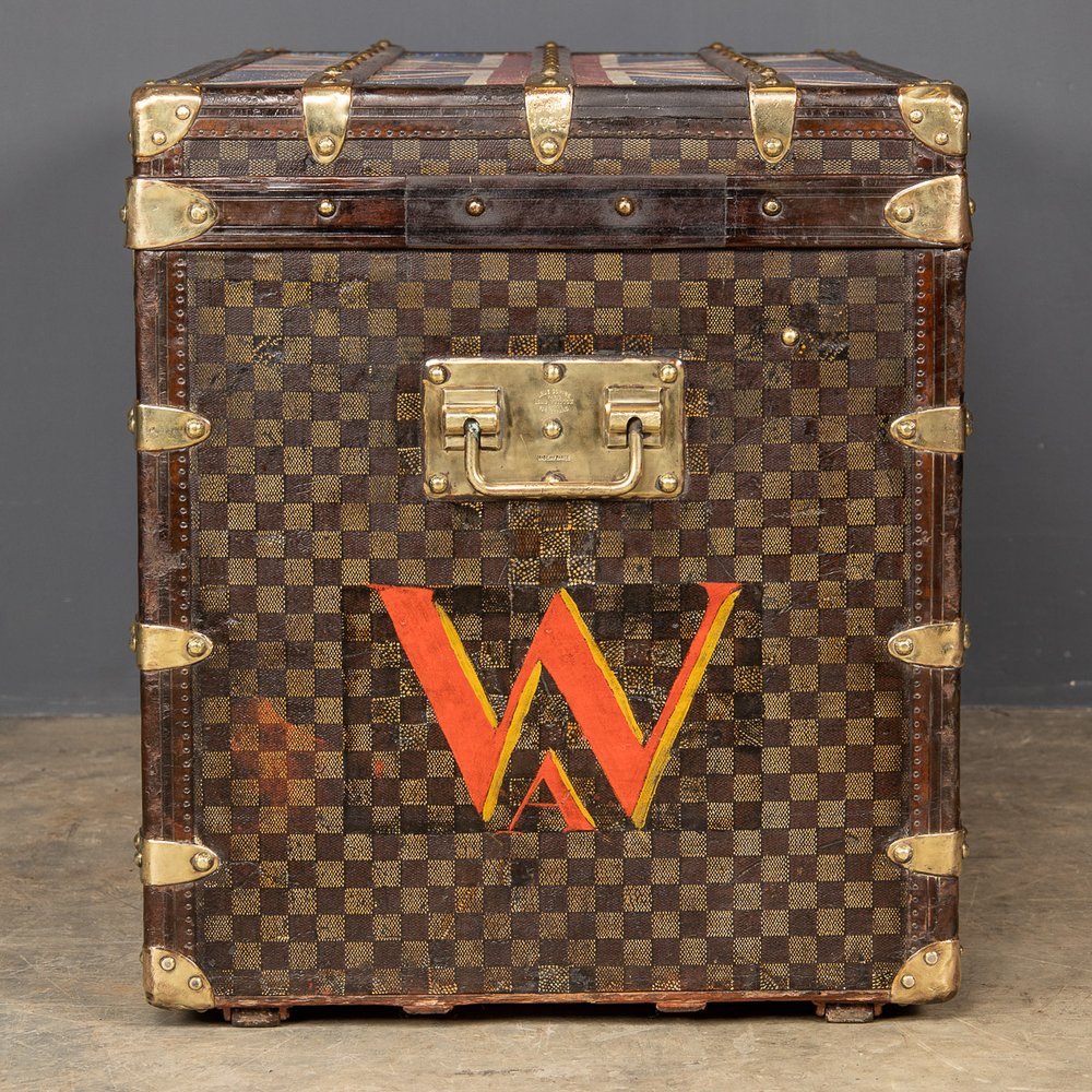 A courier trunk by Louis Vuitton