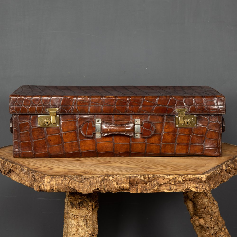 Lot - LOUIS VUITTON MONOGRAM COATED CANVAS STEAMER TRUNK, LATE 19TH  CENTURY/EARLY 20TH CENTURY 25 x 38 1/4 x 22 in. (63.5 x 97.2 x 55.9 cm.)